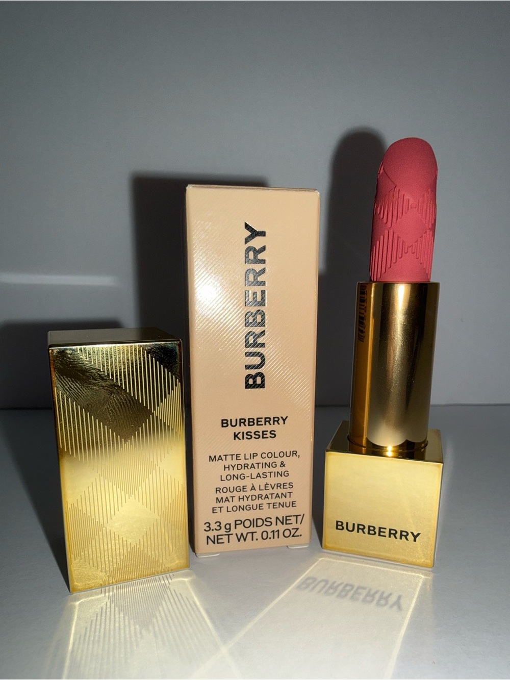 Burberry Matte Lipstick in Deep Peaxh with Gold magnetic lid closing Case